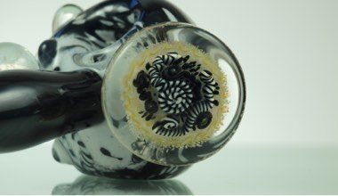 Heady glass pipe with multicolored opal accent by local glass artist Dan Brooks