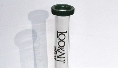 Large white and black glass bong labelled "Lookah Glass"
