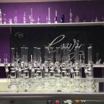 Envy scientific glass bong display on smoke shop countertop