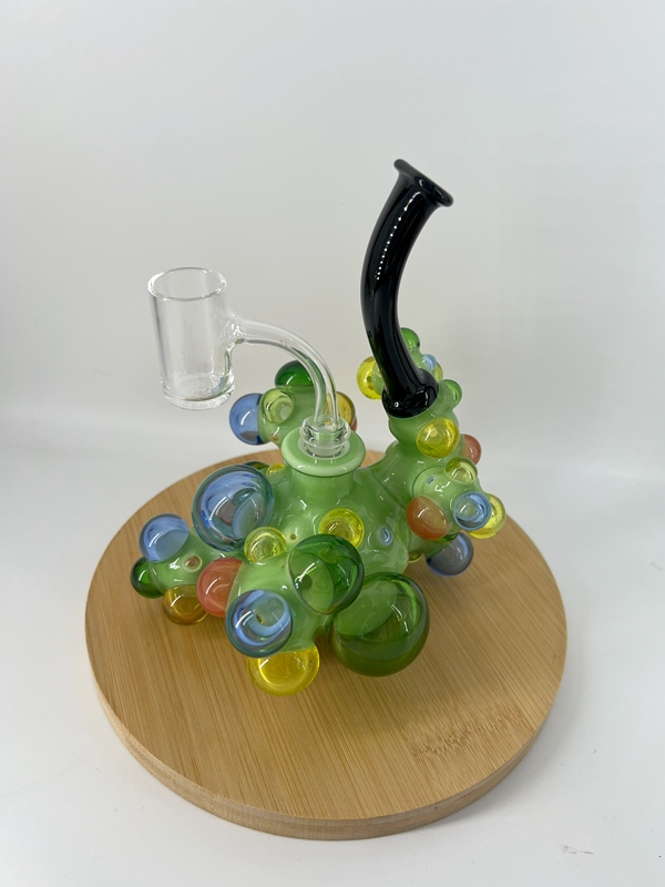 Green heady glass bong with globular opal accents in assorted colors