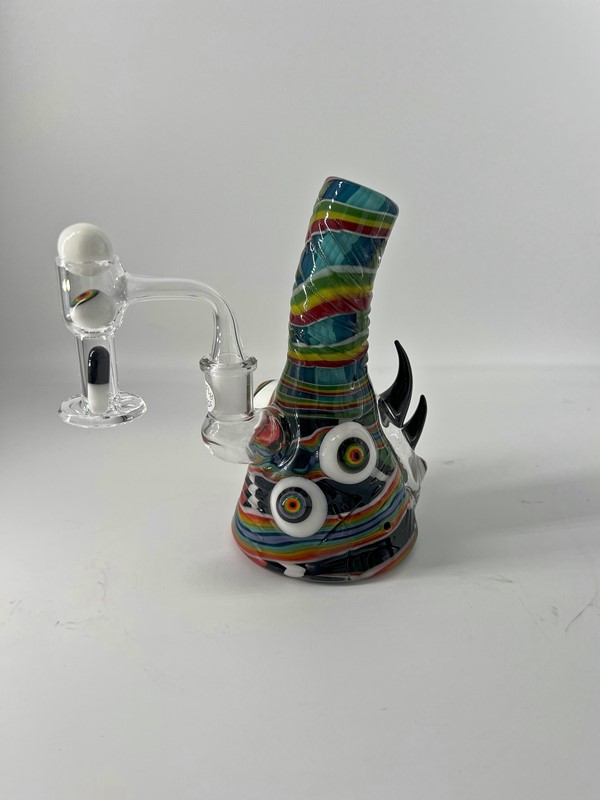 Miniature multicolored bong with monster eyes and glass spike accents