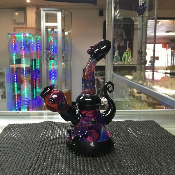 Purple heady glass bong with black opal and glass swirl accents